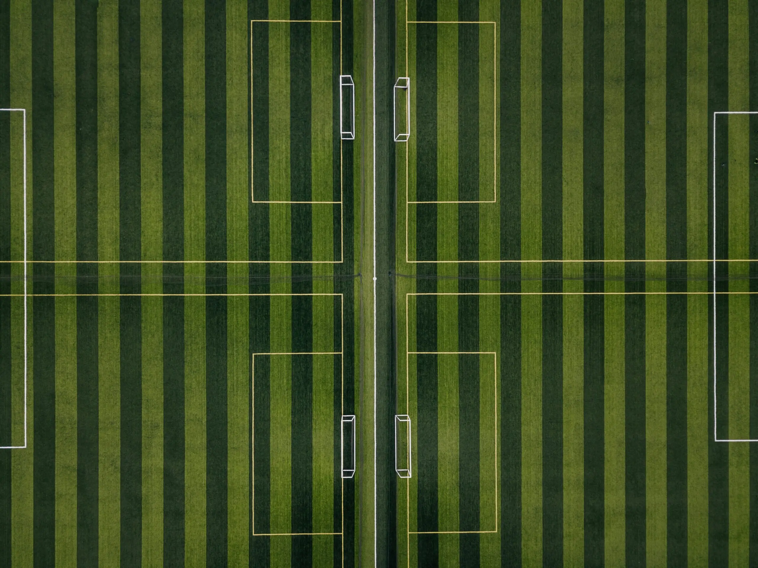 Aerial view of striped soccer fields.